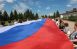В Самарской области «Единая Россия» и «Молодая Гвардия» развернули многометровые триколоры в честь Дня России